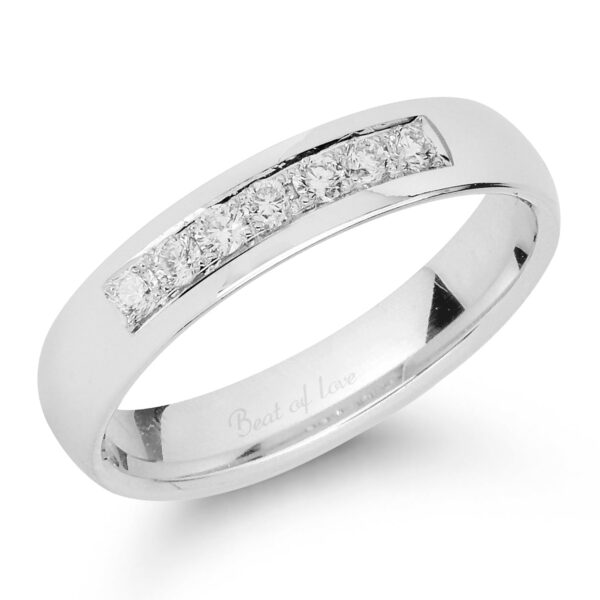 Valkokulta kihlasormus timanteilla